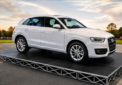 SUV loaded on a portable stage platform