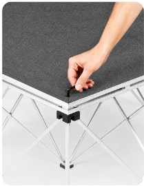 Hex-key locking point securing an Easy-Lite IntelliStage riser to the platform
