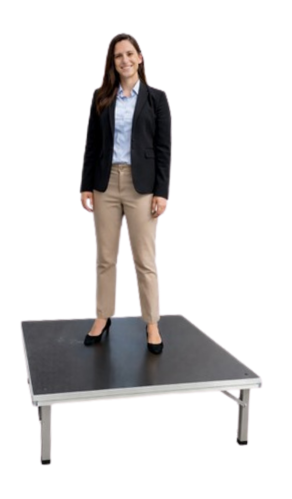 Woman standing on a fully set-up stage � Lock & Ready step